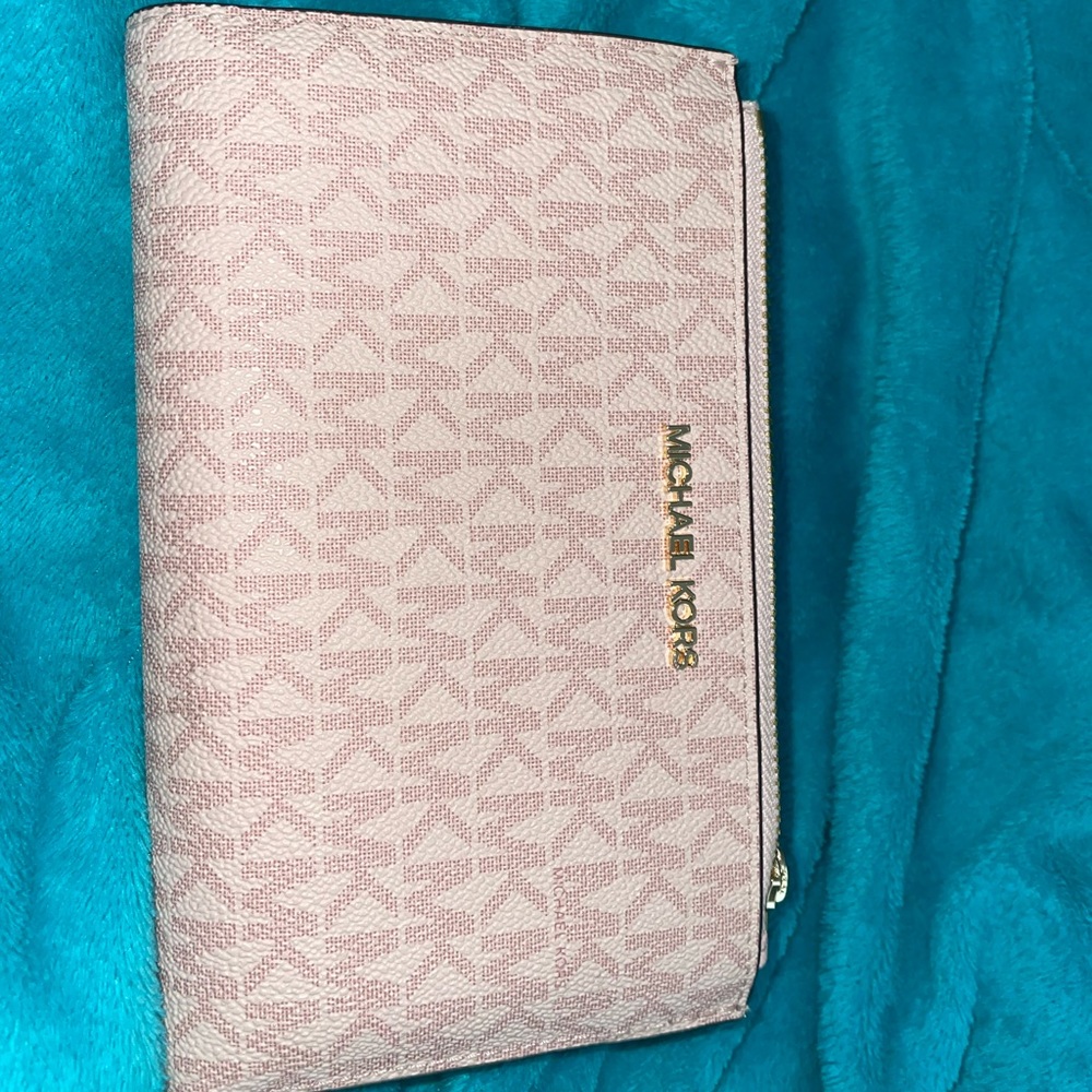 Michael Kors “Pink” wallet.